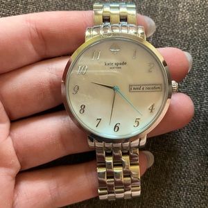 Kate spade silver watch. Lightly used. Perfect condition. Extra watch links.